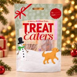 Treat Eaters julegavepose med lækre hundegodbidder i et hyggeligt julemiljø. Perfekt som julegave til hunden.