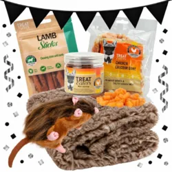 Forkæl din hund med en pakke fyldt med hyggefavoritter: khakifarvet vetbed, Rotten Benny, tyggepinde, Mini Cubes og sprøde kyllingeben.
