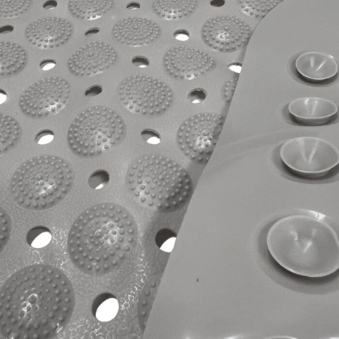 Dette skridsikre underlag bidrager til at gøre badet til en mere behagelig oplevelse for din hund