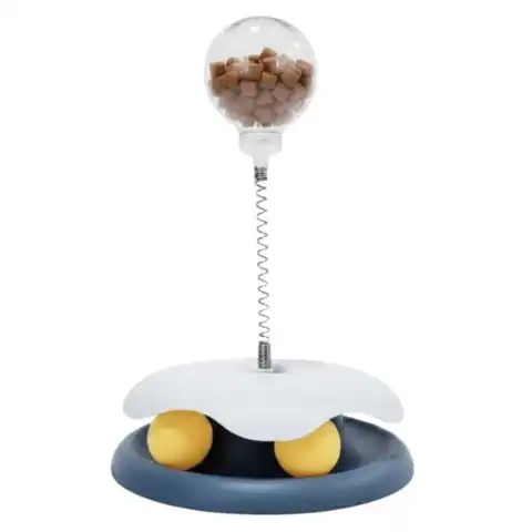 Sjovt legetøj med plads til godbidder i toppen, og tennisbolde i bunden