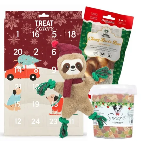 Forkæl din hund med julekalender, blødt juledovendyr, lækkert luciabrød og 500 g julemix. En skøn julepakke med godbidder, leg og hyggelige stunder.