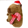 Capivara julebamse med julestok og nissehue