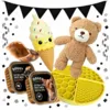 Hvalpepakke med Teddy-bamse, latex-isvaffel, gul slikkemåtte, kalveklov og to bægre vådfoder, vist med Black November-flagguirlande